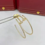 Chic Gold Large Nail Hoop Earrings with Sparkling Accents - Image 4