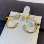 Chic Gold Nail Hoop Earrings for a Modern Statement - Image 7