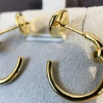 Chic Gold Nail Hoop Earrings for a Modern Statement - Image 6
