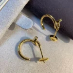 Chic Gold Nail Hoop Earrings for a Modern Statement - Image 4