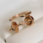 Chic Rose Gold Nail Hoop Earrings for a Modern Statement - Image 6