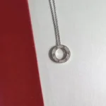 Chic Silver Circle Pendant Necklace with Elegant Stone Detailing - Image 2