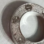 Chic Silver Circle Pendant Necklace with Elegant Stone Detailing - Image 3