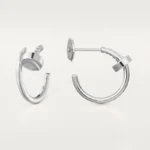 Chic Silver Nail Hoop Earrings for a Modern Statement - Image 2